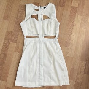 White cut out dress. In good condition.